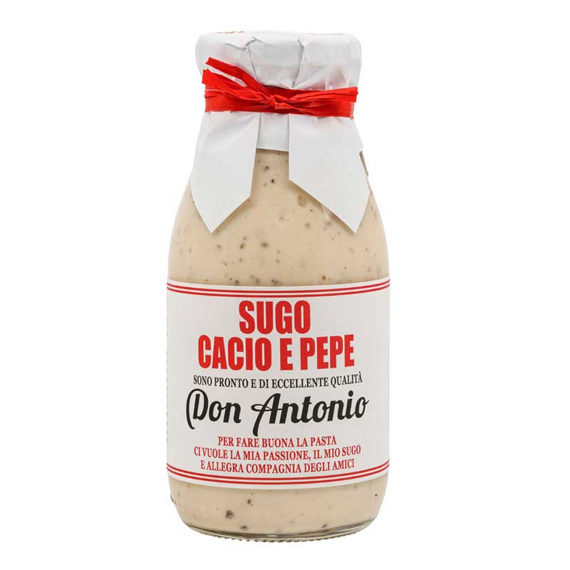 Bottle of Don Antonio Cacio e Pepe with paper around the lid held by a red ribbon on a white background