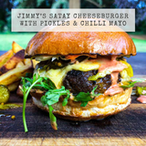 Satay cheeseburger recipe with pickles and chili mayo on a wooden board, text overlay 'Jimmy's Satay Cheeseburger with Pickles & Chilli Mayo'.