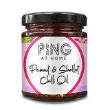 Jar of Master Chef Winner Ping Coombes Peanut & Shallot Chilli Oil with 'PING at Home' label on a white background