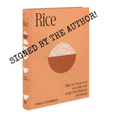 A picture of the cook book called Rice by Masterchef winner Ping Coombes with a cover illustration of a bowl of rice signed copy.