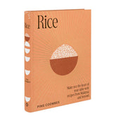 A picture of the cook book called Rice by Ping Coombes showing a terracotta coloured cover with an illustration of a bowl of rice.