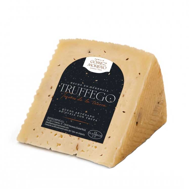 A 250g piece of Familia Gomez Moreno Manchego with Black Summer Truffles on a white background 
