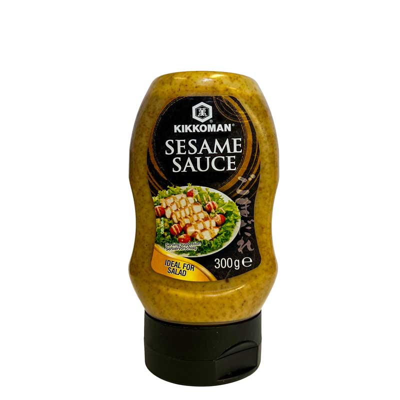 A 300g squeezy bottle of Kikkoman Sesame Sauce with a black label, the bottle is on a white background