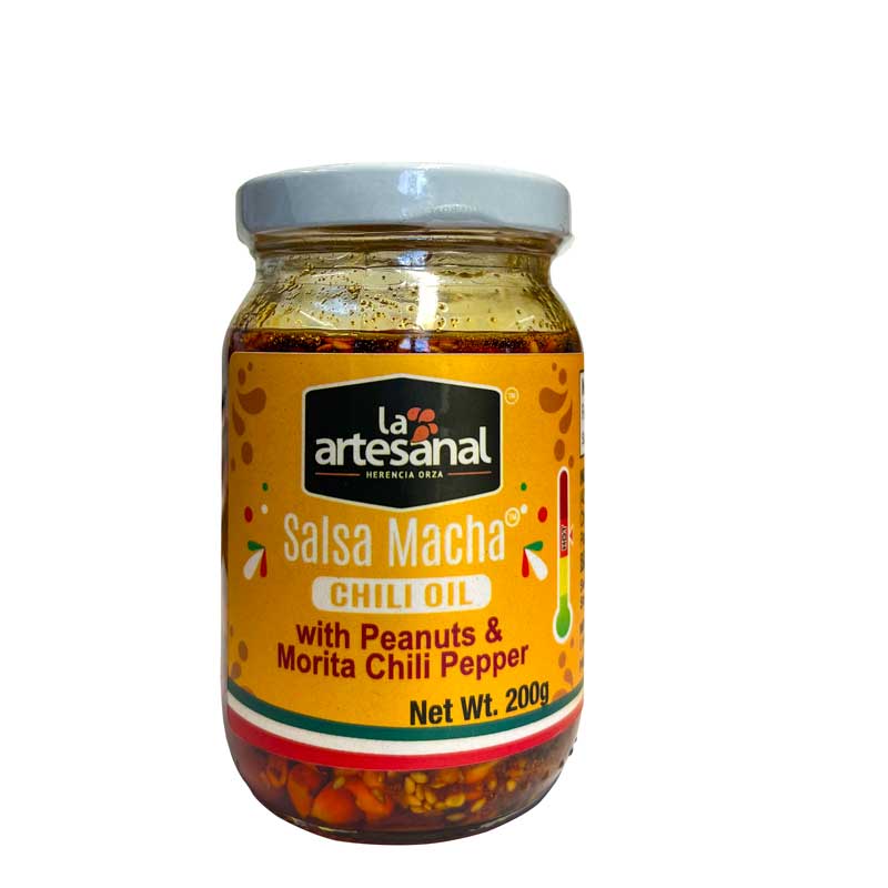 A jar of La Artesanal Mexican Salsa Macha Chilli Oil with Peanuts and Morita Chilli Peppers, the jar has an attractive yellow label and it's on a white background.