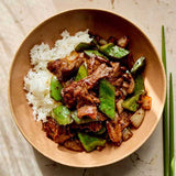 Recipe for Stir-fried Black Pepper Beef with Green Peppers by Ping Coombes from her cook book titled "Rice".