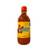 Bottle of Valentina hot sauce with a red cap on a white background