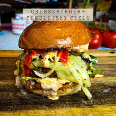 Recipe for Shedletsky's Cheeseburger showing a delicious burger with sauerkraut, hot sauce and a toasted bun